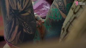 Tatted Dreadlock Beauty Takes Charge in a Wild Ride