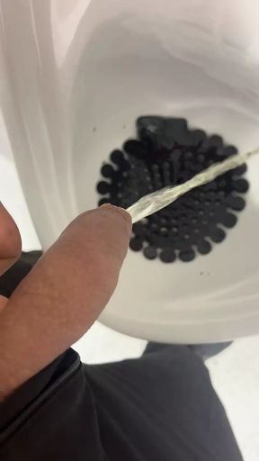 Natural uncut cock pissing on the morning, hot and semi hard