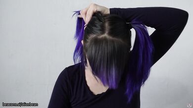 Alt blue trims fringe while freckled British mouth swallows
