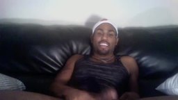 Ebony Guy Sits Back and Massages Manhood