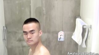 Handsome Asian amateur stroking his cock after the shower