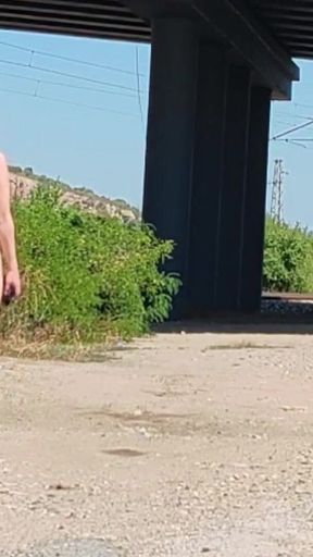 Slave Tih Shows Her Pussy and Tits Under the Bridge