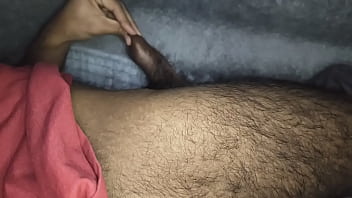 Hairy Indian men playing with dick inside blanket