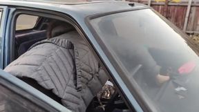 Tranny GILF revs up ancient Peugeot 205 diesel on British roads