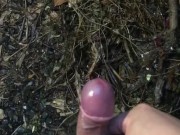 My phimosis penis masturbation by hand in the rainy garden.  The tip of the penis is red