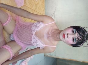 Oanh Le transgender wearing a sexy robe masturbating happily