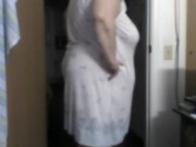 a big woman in nightgown