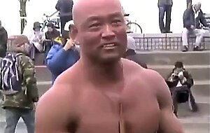 Muscled Asian Stud Bares Almost All at the Beach