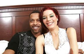 Redhead screwed by a big black cock