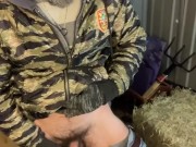 Bearded farmer pisses in barn