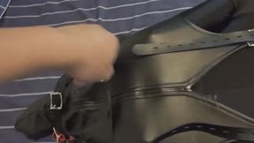 Multi-layered hood with leather restraints for breath control