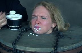 Blonde white milf restrained in the barrel and fed with white goo