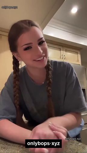 Teen influencer shows off her big tits and blonde hair in the kitchen