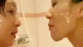 Lesbian Lovers Soaked in Slimy Passion – Steamy Bathtub Encounter