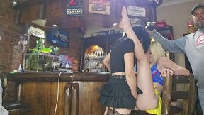 girls fucking each other with a strapless dildo while husbands watch