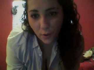 Chubby brunette chick takes off her shirt and flashes tits