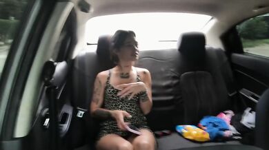 My friend undresses in my car, showing her breasts, eager for a penis.