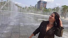 expressiagirl flashes her big tits and hairy pussy in the city center