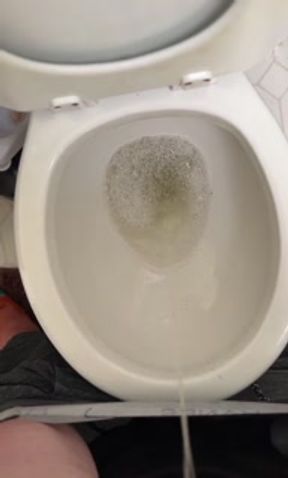 HOLDING IN A VERY DESPERATE PEE