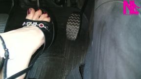 Driving in Buckled Open Toed Black Sandals and Thin Anklet