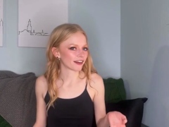 Oiled blonde plays with latex solo