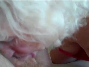 Blonde granny eating a young shaft