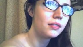 Delicious brunette in stockings and corset toying her pussy