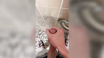 Slim twink jerks off and cums in public shower