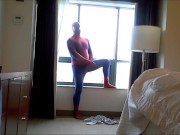 spiderman strips and cums on hotel window