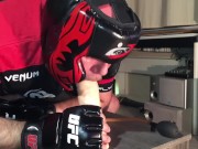 Playing with inflatable dildo in full boxing gear