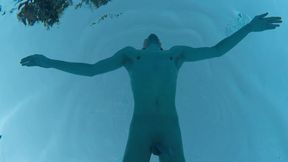 Indoor public pool solo uncut nude fit man swimming