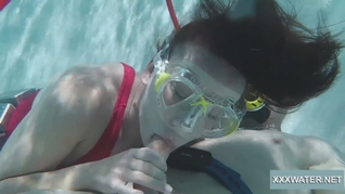 Underwater blowjob goes two way