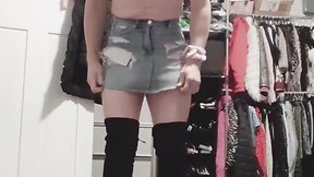 Femboy wearing jean skirt and bralette