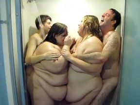 2BBWs and 2 guys in one showeroh what wet fun