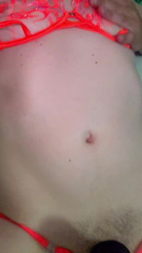 Sissy Masturbating in Orange Lingerie Wearing Cock Rings