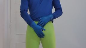 Clown putting on leather bike overall