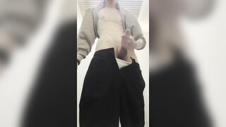 youngster pops in an airport wc