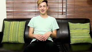 Adorable twink is interviewed and then he takes a big toy