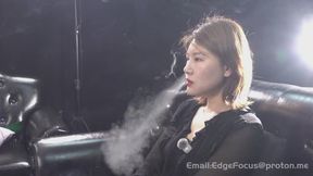 Intense Cigarette Smoking Interview with Elegant Asian Woman on Black Leather Couch — LIN1 4K