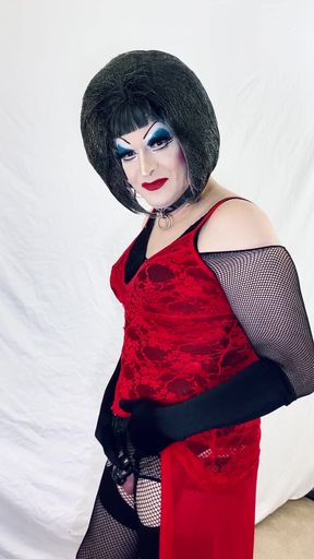 Heavy makeup drag slut strips to lingerie   Clip 1