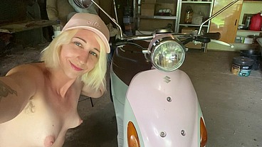 Hairy girl - motorbike cleaning