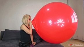 Kia overinflate giant red balloon (MOBILE)