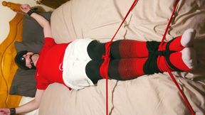 Miss M uses a footballer cuffed to bed