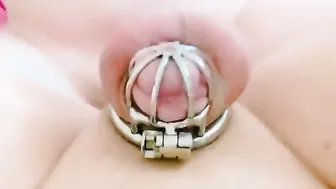 Crossdressing twink has anal sissygasm in chastity cage