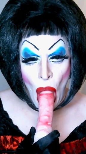 Sissy Slut in Heavy Makeup Sucks and Deep Throats Dildo on Cam   Clip 1