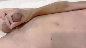 A Boy with a Large Foreskin Gets an Erection, Masturbates, and Cums Twice