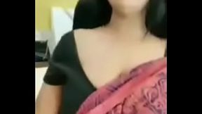 Indian teen shows off her big boobs while dancing on webcam