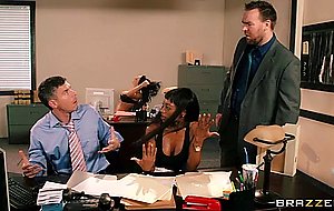 Alektra blue sits on her desk and does striptease