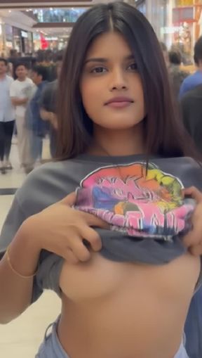 titty drop, a young, indian woman, pulling up her, video created by AI