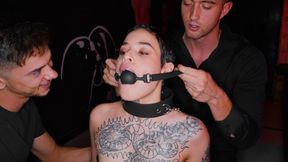 Submissive inked beauty enjoys being controlled by two dominant studs in intense BDSM play